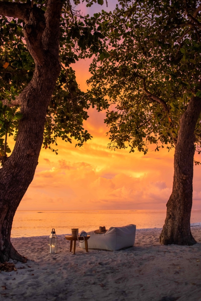 CapKaroso-Beach-sunset-loungechair-trees-2