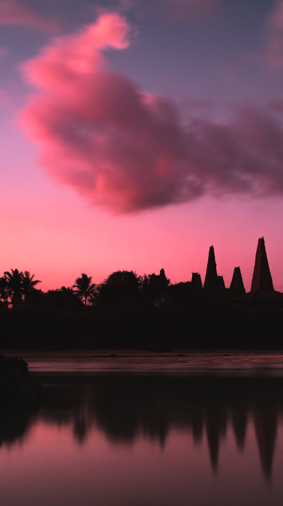Pink sunset over traditional village